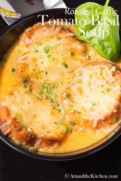 a skillet filled with cheese and spinach on top of a black countertop