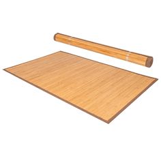 a bamboo mat with a roll of wood on the top and another piece of wood next to it