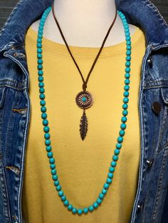 Copper and turquoise concho leather necklace with feather MADE IN USA Adjustable Turquoise Concho Necklaces, Adjustable Turquoise Concho Necklace, Adjustable Turquoise Necklace With Concho, Turquoise Concho Bohemian Necklace, Turquoise Bohemian Concho Necklace, Adjustable Turquoise Jewelry With Feathers, Blue Bohemian Concho Necklace, Bohemian Blue Concho Necklace, Copper And Turquoise