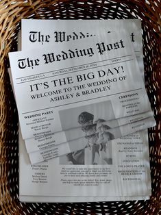 a newspaper sitting on top of a wicker basket next to a paper sign that says it's the big day