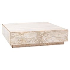 a white marble box sitting on top of a table