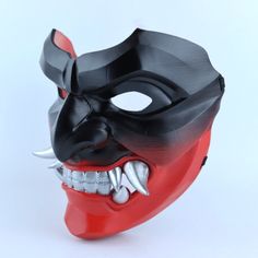 Crafted with intense detail and precision, the Kabuto oni mask with fangs is a stunning embodiment of a warrior's spirit. This kabuto oni mask has been handcrafted meticulously by our skilled artisans, using the latest 3D printer technology. Details: We cushioned the inside of the mask with soft eva foam to keep your face comfortable. The mask can stay on your face for a long time in the activity you use. It does not cause pain on your face and you can breathe comfortably. It is very robust in y Oni Mask Side View, Black Warrior Mask For Masquerade, Black Warrior Style Masks For Masquerade, Black Warrior Style Mask For Masquerade, Black Warrior Style Mask For Cosplay, Samurai Style Black Mask For Masquerade, Black Samurai Masks For Cosplay, Black Samurai Style Mask For Cosplay, Black Samurai Masks And Prosthetics For Cosplay