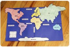 the world map is made out of paper