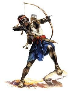 an african man with a bow and arrow in his hand, standing on a rock