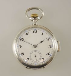 "This is a Swiss silver pocket watch which when you press in the button on the side, will chime the hours, quarters and minutes To hear and see the watch chime, please copy and paste the following link into your browser: https://youtu.be/InbT1j6ESPc movement - the gilt ¾ plate movement has a lever escapement with two hammers striking on inner gongs. The movement is in 95% mint condition Case - the movement comes in a silver open face case, which has a hinged inner, back and bezel. The inner cove Formal Pocket Watch With Stopwatch And Round Dial, Silver Chronograph Pocket Watch For Formal Occasions, Timeless Silver Pocket Watch With Stopwatch Feature, Silver Timeless Pocket Watch With Stopwatch, Plate Movement, Silver Pocket Watch, Pocket Watch Antique, Pocket Watch Chain, The Hours