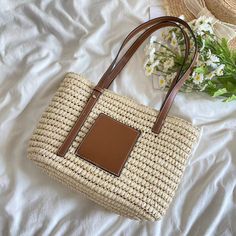 Back and better than ever, our woven straw market tote is perfect for carrying everything from your farmer's market bounty to a beach towel and a book. Note: Due to the natural variations in straw, color can vary slightly.Size approximately 28cm wide x 24cm tall or 11in x 9in. Designer Style ID: 8365 Country Style Straw Woven Tote Bag, Vintage Vibes, Summer Bag, Everyday Shoulder Bag, Beach Bag Casual Beige Rectangular Straw Bag, Beige Rectangular Straw Bag For Travel, Large Capacity Beige Rectangular Straw Bag, Beige Large Capacity Rectangular Straw Bag, Beige Rectangular Beach Bag For Daily Use, Casual Cream Straw Tote Bag, Casual Cream Straw Bag With Double Handle, Casual Beige Straw Tote Bag, Cream Straw Bag For Daily Use