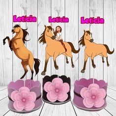 three horse cake toppers with the words letticia, letticata and two horses