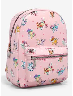 a pink backpack with cartoon characters all over it