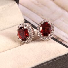 This Sterling Silver Jewelry set features an Elegant Art With Natural Garnet Gemstone. The cavity is made from genuine solid 925/92.5 Sterling silver and stamped as S925. This Jewelry is Lead free and Rhodium plated to prevent scratches and tarnish. ITEM DESCRIPTION Item Code: JACB31 Metal: 925/92.5 Sterling Silver Gemstone: Genuine Natural Garnet Gemstone Shape: Oval Gemstone Size: 7X9 MM Ring Dimension:- Length: 13 MM Width: 11 MM Weight: 2.88 gm approx Earrings Dimension:- Length: 13 MM Width London Blue Topaz Ring, Silver Jewellery Sets, Garnet Jewelry, Earrings Pendant, Garnet Ring, Matching Jewelry, Alternative Engagement Rings, Elegant Art, Deco Jewelry