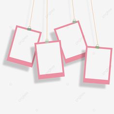 three pink frames hanging from the ceiling with clothes pins attached to them, on a white background