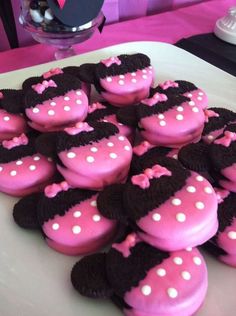 minnie mouse cupcakes are arranged on a plate