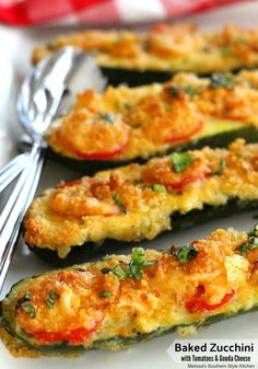 baked zucchini stuffed with tomatoes and cheese