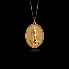 Invoke healing and protection with the Gold St. Lazarus Pendant. Crafted in solid gold, this pendant features St. Lazarus, known for his association with healing and compassion. The intricate design highlights his revered image, making this pendant a significant symbol for those seeking comfort and divine care. PENDANT INFORMATIONThis pendant is made of real, solid gold.• Made in USA• Material: 14k or 18k solid gold• Finish: polished• Height: 1.25" (31,5 mm) x Width: 0.9" (22 mm)• Pendant weight St Lazarus, Saint Lazarus, Phoenix Pendant, Gold Dragon, Egyptian Jewelry, Solid Gold Necklace, Solid Gold Chains, White Gold Chains, Dragon Pendant