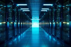 rows of servers in a data center with bright lights on the ceiling and flooring