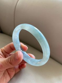 "🌈 Jade Bangle 54.0mm (2.13\"), Oval Shape, Light Green 🌷 Untreated Natural Jadeite/ Grade A Jade 🌷 Certification : Yes 🌷 Jade from Myanmar/ Burma 🌷 Shape : Oval 🌷 Inner diameter : 56.4 x 49.3mm ---> best fit for round shape 54.0mm / 2.13\" 🌷 Color : Light Green 🌷 Free standard shipping from Hong Kong with tracking included 🌷 Take approximately 7-21 days to arrive worldwide ❤️ In Chinese Culture: Young people wear jade pendant will have a prosperous life, attracts good luck and frien Aquamarine Gemstone Round Bracelets, Lavender Green, Jade Bangle, Gemstones Jewelry, Jade Pendant, Chinese Culture, Burmese, Parent Gifts, 21 Days