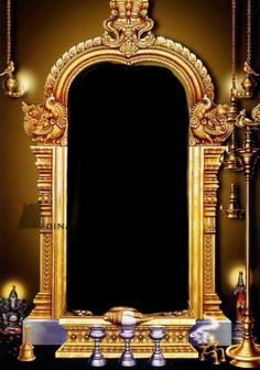 an ornate gold framed mirror with candles and other items in front of it on a black background