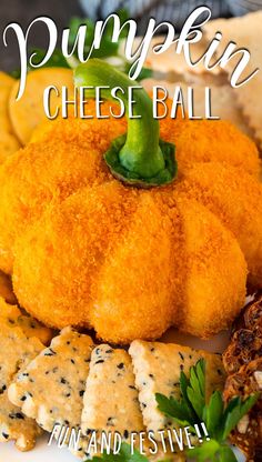 pumpkin cheese ball on a plate with crackers