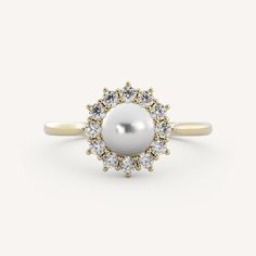 Magnolia features a 6mm pearl center stone with a burst halo on a cathedral basket setting on a half round tapered shank. Wedding Day Jewelry, Custom Wedding Band, Jewelry Education, Basket Setting, Trending Engagement Rings, Ring Trends, Engagement Rings Bridal Sets, Gemstone Engagement, Shop Engagement Rings