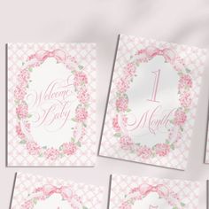 four cards with pink flowers and the number one on them