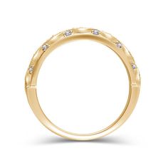 Make the day special with this art deco-inspired diamond anniversary band. Crafted in warm 14K gold, this slender style features sparkling duos of round diamonds in milgrain-edged marquise-shaped frames. Smaller accent diamonds complete the design. Radiant with 1/8 ct. t.w. of diamonds and a brilliant buffed luster, this anniversary band is a romantic look she'll love. Diamond Eternity Band With Decorative Details For Anniversary, Anniversary Diamond Eternity Band With Decorative Details, Yellow Gold Diamond Jewelry With Milgrain Detail, Gold Diamond Rings With Milgrain Detail, Heirloom Diamond Ring With Decorative Band, Round Cut, Heirloom Round Cut Diamond Ring With Decorative Band, Classic Diamond Eternity Band With Decorative Design, Elegant Diamond Ring With Decorative Band, Classic Diamond Ring With Decorative Band For Anniversary