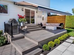 an outdoor patio with steps leading up to it