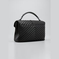 Saint Laurent "College" chevron-quilted leather shoulder bag. Removable flat top handle, 2.8" drop. Detachable shoulder strap, 14.4" drop. Flap top with logo medallion. Exterior, back slot pocket  Black hardware. Center zip compartment divides interior; one back slip pocket. Cotton/leather lining. 7.9"H x 12.6"W x 3.4"D. Made in Italy. Designer Textured Leather Crossbody Bag, Luxury Textured Leather Crossbody Bag, Designer Textured Leather Double Handle Bags, Ysl Shoulder Bag, Quilted Shoulder Bag, Black Hardware, Flats Top, Quilted Leather, Bergdorf Goodman