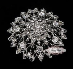 Gold Rhinestone Brooch Embellishment - Flatback - Brooch Bouquet - Supply - Broach - RD228 Also available in silver. Please check other listings. Flatback. Can be glued using E6000 or other type of industrial strength glue. Can be wired using floral wire. 56x56x15mm (Approx. 2.2 x 2.2 inches) We make every effort to ensure that are products are packed well enough to sustain transit, however, due to the delicate nature of this product, a rhinestone may fall off during delivery. If that is the cas Crystal Bouquet, Bridal Favors, Brooch Bouquet, Floral Wire, Flower Plates, Crystal Brooch, Gold Rhinestone, Pin Jewelry, Crystal Wedding