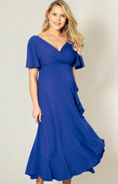 What's not to love about the fabulous Waterfall Midi Maternity Dress. Introducing a new colourway in striking cobalt blue, this flattering shade is known for its soothing and peaceful qualities, promoting stability and calm. The Waterfall design features ruffle details on the skirt and a gathered cross-over neckline. Perfect for casual or formal styling, this versatile maternity dress is wonderful for pregnancy, nursing and afterwards. Cobalt Blue shade in premium viscose jersey Faux wrap skirtR Fitted Blue Maternity Dress With Ruffles, Elegant Blue V-neck Maternity Dress, Elegant Blue Maternity Dress With V-neck, Blue V-neck Maternity Dress, Elegant Blue Maternity Dress For Summer, Midi Maternity Dress, Rose Tiffany, Tiffany Rose, Pregnant Wedding