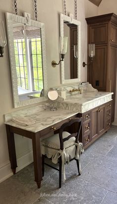 an image of a bathroom setting with vanity and mirror on the wall next to it