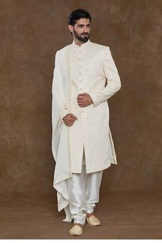 Cream sherwani featuring sequin and bead hand work in zig-zag pattern. Paired with a churidar and an embellished hem dupatta. - Aza Fashions White Semi-stitched Sherwani With Mirror Work, Formal White Kurta With Mirror Work, Designer White Bandhgala With Mirror Work, Festive Bandhgala With Mirror Work For Reception, Reception Bandhgala With Mirror Work, Transitional Season Reception Bandhgala With Mirror Work, Transitional Reception Bandhgala With Mirror Work, Bollywood Style Bandhgala With Mirror Work, White Bollywood Bandhgala With Mirror Work