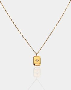 MATERIAL | signature MC stainless steel necklace + cz pavé diamond detail GOLD | 18k gold-plated stainless steel SILVER | polished stainless steel SIZE | CHAIN - 16" length + 1.5" extender + PENDANT - 0.4" x 0.3" rectangle DETAIL | hypoallergenic + water-resistant + sustainable CLOSURE | spring ring clasp Signature MC jewelry tag for authenticity Designed with love in USA Gold Jewelry With Diamond Accents And Rectangular Dial, Rectangular Gold Diamond Jewelry, Gold Jewelry With Rectangular Stone For Formal Events, Gold Jewelry With Rectangular Stone For Formal Occasions, Formal Gold Jewelry With Rectangular Stone, Luxury Yellow Gold Rectangular Jewelry, Gold Diamond Rectangular Necklace, Gold Diamond Necklace With Rectangular Shape, Gold Jewelry With Rectangular Polished Stone