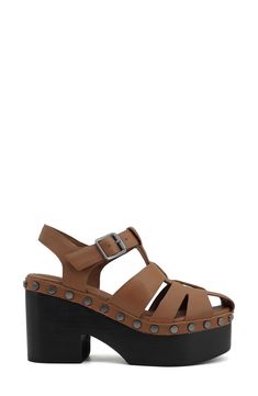 A boosted block heel and platform turn up the volume of this water-resistant leather fisherman sandal trimmed with oversized studs. 3 3/4" heel; 2" platform Leather upper, lining and sole Imported Summer Leather Platform Clogs, Summer Leather Footbed Clogs With Block Heel, Leather Sandals With Studded Block Heels, Leather Sandals With Studded Rubber Outsoles And Block Heel, Summer Leather Clogs With Ankle Strap, Leather Clogs With Ankle Strap For Summer, Ankle Strap Leather Clogs For Summer, Fisherman Sandals Women, Turn Up The Volume