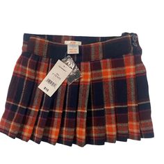 Get Your Little One Ready To Rule The Playground With This Adorable Plaid Pleated Skort. Perfect For Twirling, Jumping, And Pretending To Be A Tiny Fashionista. Size: 4t Brand: Joe Fresh Plaid Pattern Pleated Design Includes Spare Button New With Tags Waist To Bottom: 9 Inches Waist: 10.5 Inches Size: Girls 4t Condition: New With Tags Weight Before Shipping: 5 Oz ** Bundle And Save ** Take A Look Through My Closet To See If There Are Other Items You Would Like To Throw Into A Bundle. You Can Hav Fresh Girls, Joe Fresh, Size 4t, Red Plaid, Kids Bottoms, Plaid Pattern, Take That, Plaid, Navy