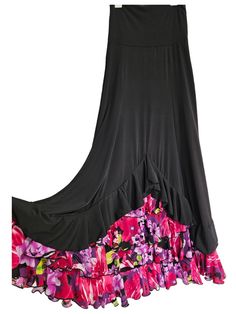 This listing is for a Beautiful flamenco skirt , made all with a very  soft and comfortable  stretch fabric in  black  with floral print polyester,A line ,very flattering , choose your size, ideal for your classes or recitals   ,fold over waistband will make it adaptable to your height (no zipper) also this stretch fabric  makes the skirt  adaptable to different sizes and body shapes . Measurements are approximately , SMALL/MEDIUM Waist stretches from 26'' (66cm) to 32'' (81.5cm) Hips stretches from 37'' (94cm) to 42'' (107cm) Total length is 47" (119.5cm) including the foldable waistband of 6.5" (17cm) MEDIUM/LARGE Waist stretches from 28'' (71cm) to 36'' (91.5cm) Hips stretches from 39'' (99cm) to 46'' (117cm) Total length is 48" (122cm) including the foldable waistband of 6.5" (17cm) LA Black Floral Print Tiered Skirt, Black Stretch Skirt With Ruffle Hem, Spring Black Maxi Skirt With Ruffle Hem, Black Floral Print Flowy Skirt, Black Flowy Floral Skirt, Black Ruffled Maxi Skirt For Summer, Black Floral Print Tiered Maxi Skirt, Black Tiered Ruffled Maxi Skirt, Black Flowy Skirt With Attached Cancan