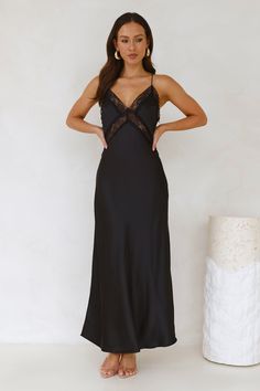 Length from bust to hem of size S: 126cm. Chest: 40cm. Waist: 38cm. across front only of size S. Maxi dress. Lined. unlined lace panels. Model is a standard XS and is wearing size XS. True to size. Non-stretch. V-neck. Lace details. unlined. Zipper. Cold hand wash only. Polyester. An ultra-romantic style! The Ultimate Love Satin Slip Maxi Dress features a silky satin design. lace panels and a straight flowy silhouette that we're in love with. Style with heels and curls for all the likes. Satin Design, Slip Maxi Dress, Maxi Dress Black, Satin Slip, Lace Panelled, Romantic Style, Dress Romper, Black Maxi Dress, Lace Detail