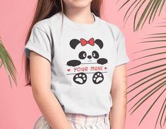 Panda Kids Customized Graphic T-shirt | Birthday Girl Custom Panda Shirt with Name | Funny Animal Shirt | Panda Bear Baby One Piece Shirt CHECKOUT INSTRUCTIONS 1. Pick a SIZE & QUANTITY from the drop down menu under the price. 2. Add it to your cart. 3. When the shirt is added to the shopping cart, please leave a NOTE ( with the Name or Words to be printed) during checkout. DETAILS | FABRIC | COLOR Baby One Piece, Toddler and Youth T-shirts Available: Condition: 100% brand new Material: 6.0 Cute T-shirt With Name Print For Gift, Customizable Cute White T-shirt, Playful Customizable Crew Neck T-shirt, Customizable Playful Crew Neck T-shirt, Cute Name Print T-shirt For Gift, Cute T-shirt With Name Print As Gift, Cute Cartoon Print T-shirt For Gift, Cute Cartoon Print T-shirt As Gift, Playful White Customizable T-shirt