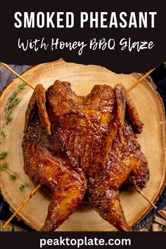 grilled chicken wings with honey bbq glaze on a wooden platter and title text reads smoked pheasant with honey bbq glaze