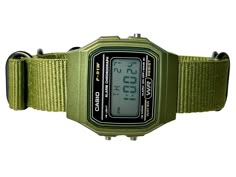 This retro Casio in stock form is already cool, functional, affordable, and accurate-- but with some magic from RLSWW, it's made even cooler-- with a ballistic nylon strap to match your personality. In addition-- you may select the option to modify the screen color to further reflect your tastes and bring some color to your wrist. Note, this is a permanent modification to the screen, not the LED backlight. It will be colored in all light conditions :) Please note: This is a permanent modificatio Black Casio Watch, Masc Cottagecore, Casio Digital, Formal Coat, Green Watch, Screen Color, Led Backlight, Sneakers Men Fashion, G Shock