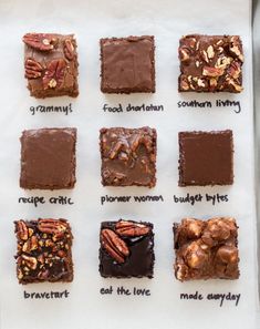 chocolate brownies with nuts and pecans arranged on a sheet of white parchment paper