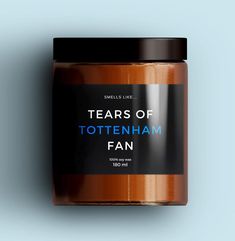 a jar of teas of tottenham fan on a blue background