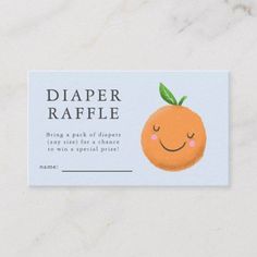 a business card for diaper raffle featuring an orange with a smile on it's face