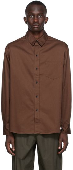 Long sleeve cotton twill shirt in brown. · Pointed spread collar · Button closure · Patch pocket at chest · Single-button barrel cuffs · Embroidered logo at side-seam Supplier color: Dark chocolate brown | Meta Campania Collective Brown Pablo Shirt Brown Cotton Shirt With Pockets, Brown Long Sleeve Shirt With Buttons, Brown Workwear Tops With Button Closure, Classic Brown Tops With Button Closure, Brown Button Closure Tops For Work, Brown Tops With Button Closure For Work, Classic Brown Tops With Button Cuffs, Brown Workwear Shirt With Button Closure, Brown Button-up Tops With Placket