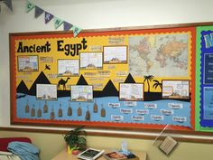 a bulletin board with an ancient egypt map on it and other information about the world