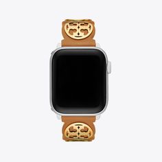 Made exclusively for your Apple Watch®, our Miller Band is inspired by our iconic logo collection. It’s crafted in leather, with gold Double T hardware. Designed to sit comfortably on your wrist, it is perfect for everyday wear. To attach, push the quick-release button on the back of the watch to slide out and replace the existing band. Womens Designer Watches, Designer Watches, Smart Watches, Iconic Logo, Tory Burch Miller, Logo Collection, Quick Release, Watch Design, Apple Watch