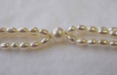 The size of the rice shaped Freshwater pearls are 3x3.5mm and 6.5x7mm, silver white in color with very high luster. It comes with the silver one touch clasp. THIS IS THE LISTING FOR THE CLASP IN SILVER Please read my shop policies for more details! We will ship out the goods once we have received payment. For more information, Like us on Facebook, follow us on Instagram or visit our website www.ikedapearl.com If you have any questions or inquiries, please don't hesitate to contact us. Elegant Double Strand Pearl Necklace With Polished Beads, Classic Polished Pearl Bracelet Gift, Classic Polished Pearl Bracelet As Gift, Classic Polished Pearl Bracelet As A Gift, Elegant Double Strand Polished Pearl Necklace, White Oval Beaded Jewelry, Classic Polished Pearl Necklace For Wedding, Classic Wedding Pearl Necklace With Polished Beads, Elegant White Pearl Bracelet With Polished Beads