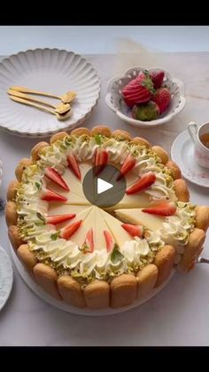 a table topped with plates and cups filled with food