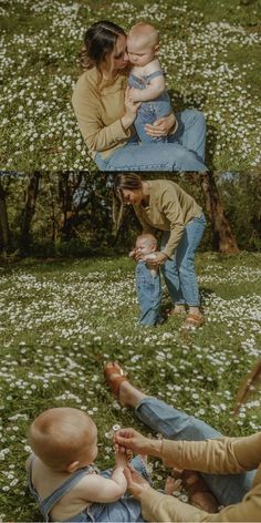 a couple of people sitting in the grass with one holding a baby and another holding an infant