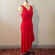 Michael Kors Red Asymmetric Hemline Dress 100% Authentic Guaranteed! Size Medium - 19” Pit To Pit, 44” Long Back Center To Middle Of Asymmetric Cut Bottom 94% Polyester/6% Spandex Made In Vietnam Machine Wash Form Fitting & Sexy. Cross Front Neckline. Side Zip With Beautiful Gold Tone Details. Asymmetric Hemline. Nwot - New Without Tags - Never Worn A35 Michael Kors Dresses, Asymmetrical Dress, Dress 100, Red Gold, Side Zip, Vietnam, Colorful Dresses, Michael Kors, Spandex