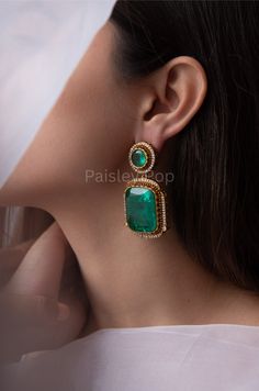 Our Green earrings are inspired by the Victorian era, representing luxury and rich taste. The Victorian earrings feature green doublet stones outlined with cubic zirconia in an array. The cocktail earrings showcase excellent craftsmanship to add a touch of royalty to your Western look. Pair these dazzling earrings with your favorite outfit to make it more lustrous. Closure - Push Back Paisley Pop travels the depths of India to learn techniques and crafts from deep down in the local markets and villages. We give utmost importance to our quality and packaging. Our goal is to ensure you receive exactly what you are looking for and for your experience to be special and memorable. We are ready to help and advise you through your purchase. IT' S  A W E S O M E * Our lovely packaging is designed