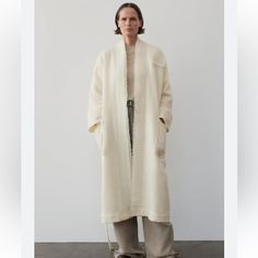 Zara Manteco Zw Collection Wool Robe Coat White Size M-L Retail $259 100% Wool Nwt Self Tie Belt Interior Lining Made Of Viscose Manteco Wool Patch Pockets Oversized Long Outerwear In Winter White, Long Beige Outerwear For Daywear, Beige Long Relaxed Fit Outerwear, Relaxed Fit Long Coat For Daywear, White Stand Collar Outerwear For Work, Oversized Long Outerwear In Neutral Color, Cream Long Outerwear For Daywear, Winter White Long Outerwear For Spring, Long Linen Outerwear For Winter